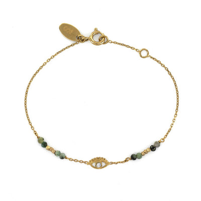 Bracelet créateur de bijoux fantaisie Stalactite Paris. Le bracelet fantaisie Mini Eye est en vermeil agrémenté de turquoises africaines