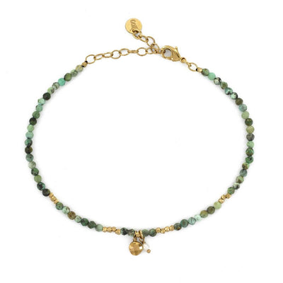 Bracelet créateur de bijoux fantaisie Stalactite Paris. Le bracelet fantaisie Kio est en plaqué or agrémenté de turquoises africaines