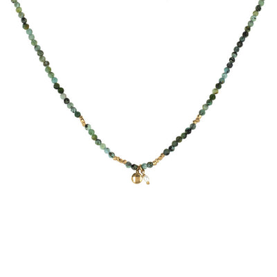 Collier créateur de bijoux fantaisie Stalactite Paris. Le collier fantaisie Kio est en plaqué or, agrémenté de turquoises africaines